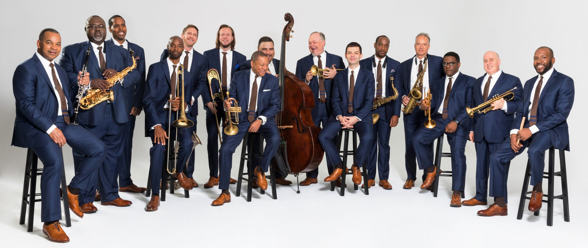 Group photograph of the entire Jazz at Lincoln Center Orchestra, with Wynton Marsalis in foreground