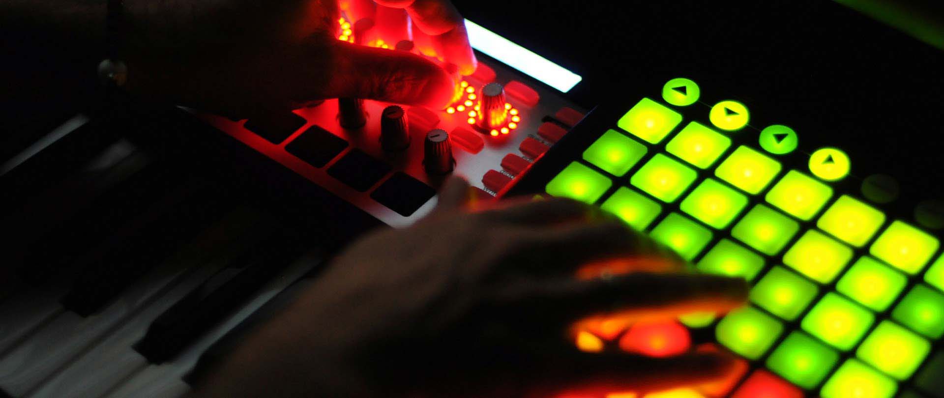 Hands on a flashing sequencer